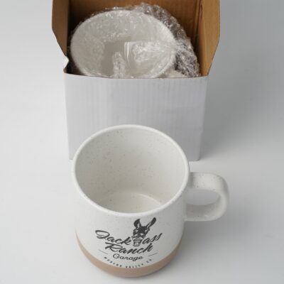 beige no-handle ceramic coffee cup