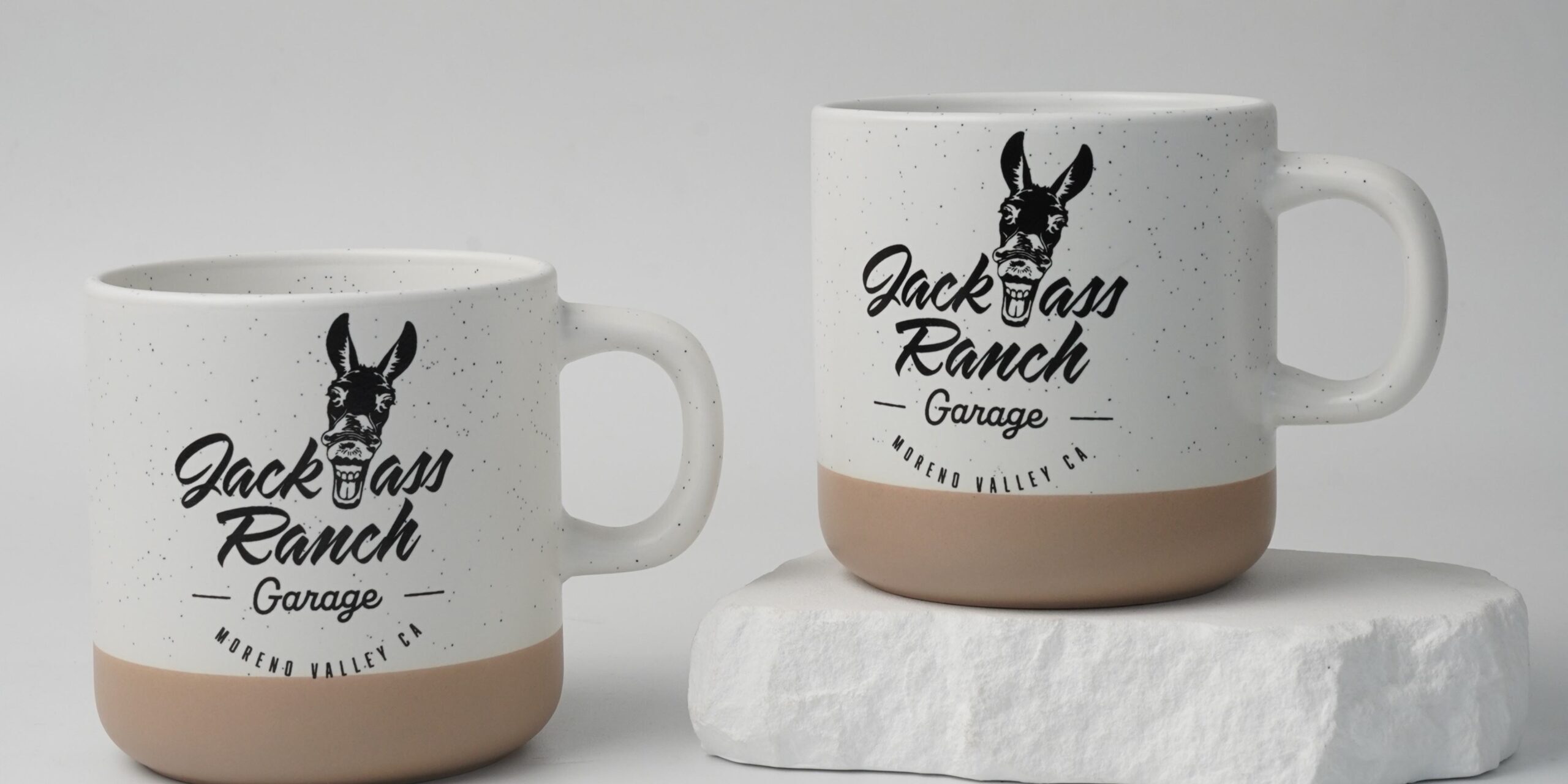 beige no-handle ceramic coffee cup